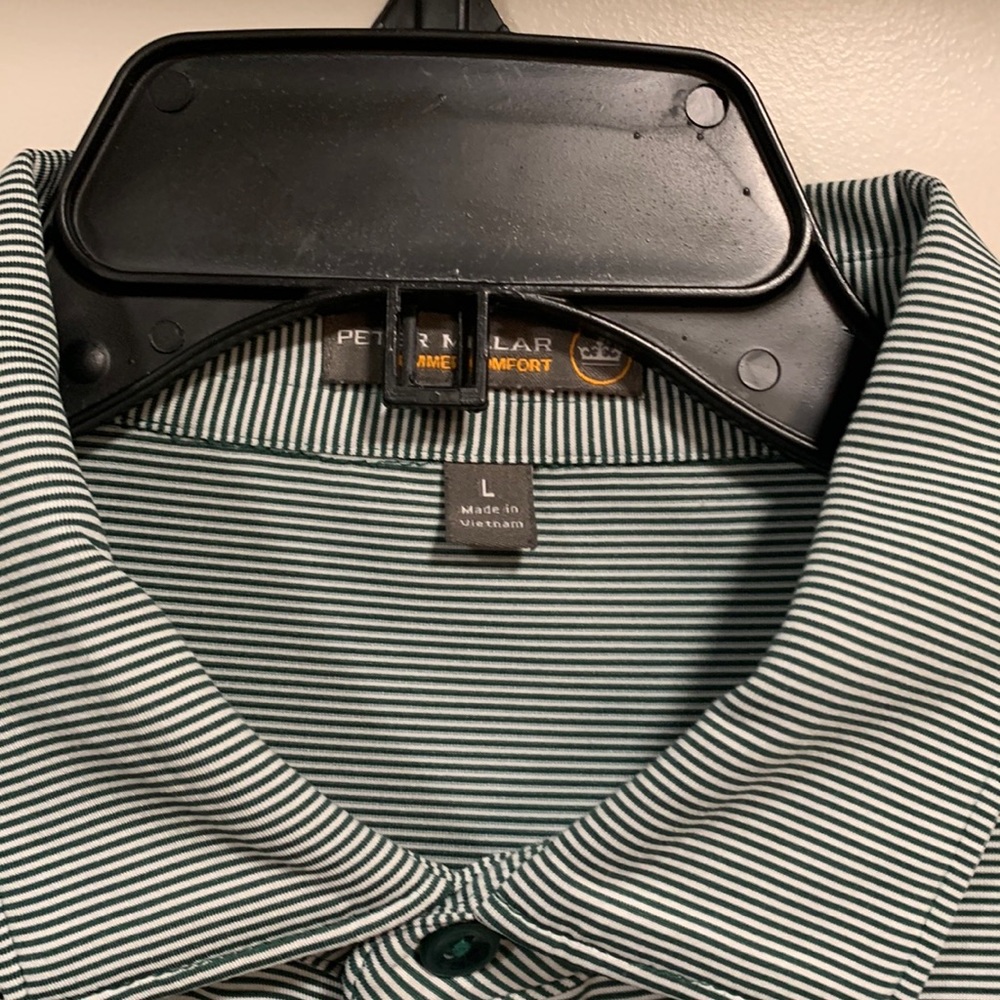 Peter Millar polo. Black hawk golf course. Size large. Perfect condition.